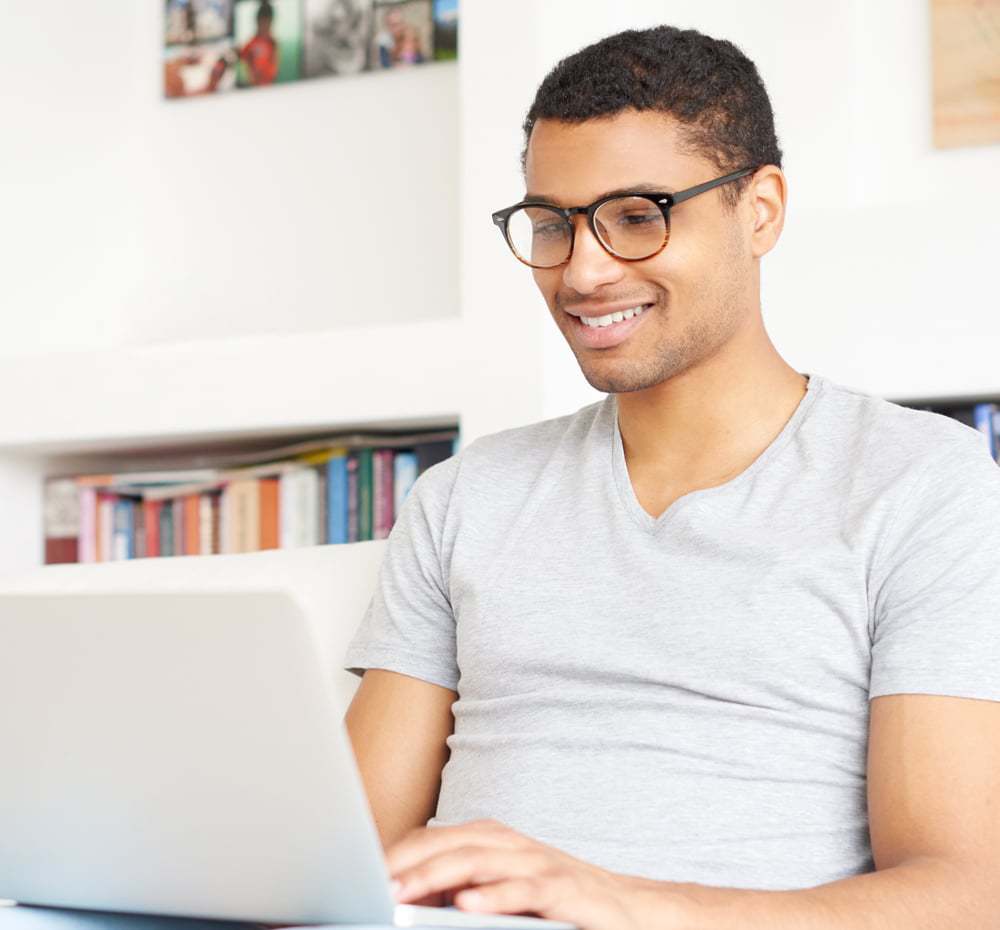 A Young Man Laptop On His Lap