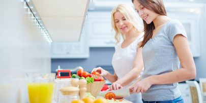 ladies-cooking-in-kitchen
