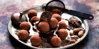 Chocolate candies truffles cocoa beans and chocolate